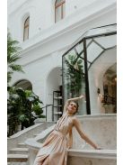 Pezsgő színű hátnélküli maxi ruha elől csavart megoldással.