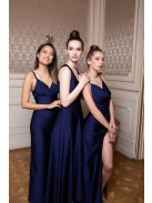 Elegáns, sötétkék színű ruha V kivágású, átlapolt mellrésszel. 