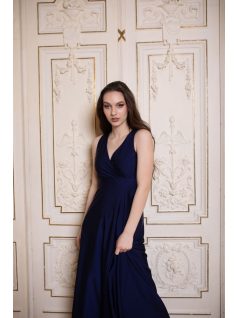 Elegáns, sötétkék színű ruha V kivágású, átlapolt mellrésszel. 