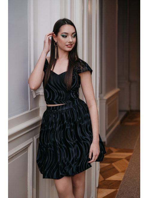 Rebeka - húzott, bőrhatású mini szoknya fekete színben