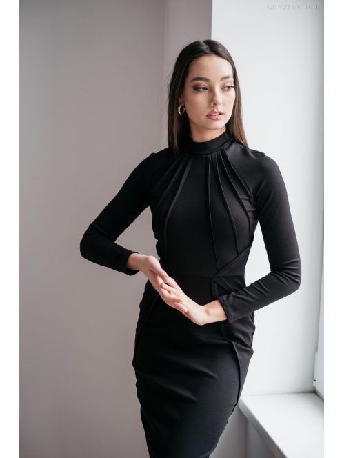 Egy igazán nőies, szűk szabású fekete színű midi ruha.