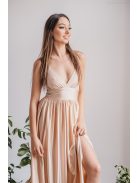 V kivágású, elasztikus anyagból készült, pezsgő színű maxi ruha. 