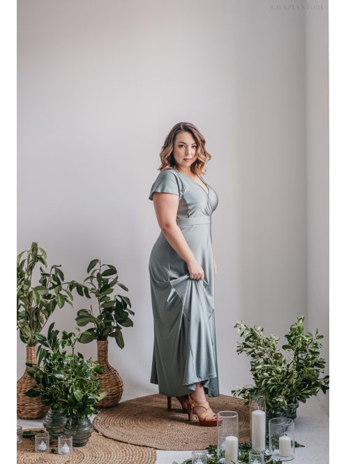 Átlapolt mellrészű zöld maxi ruha rövid ujjakkal elasztikus anyagból.